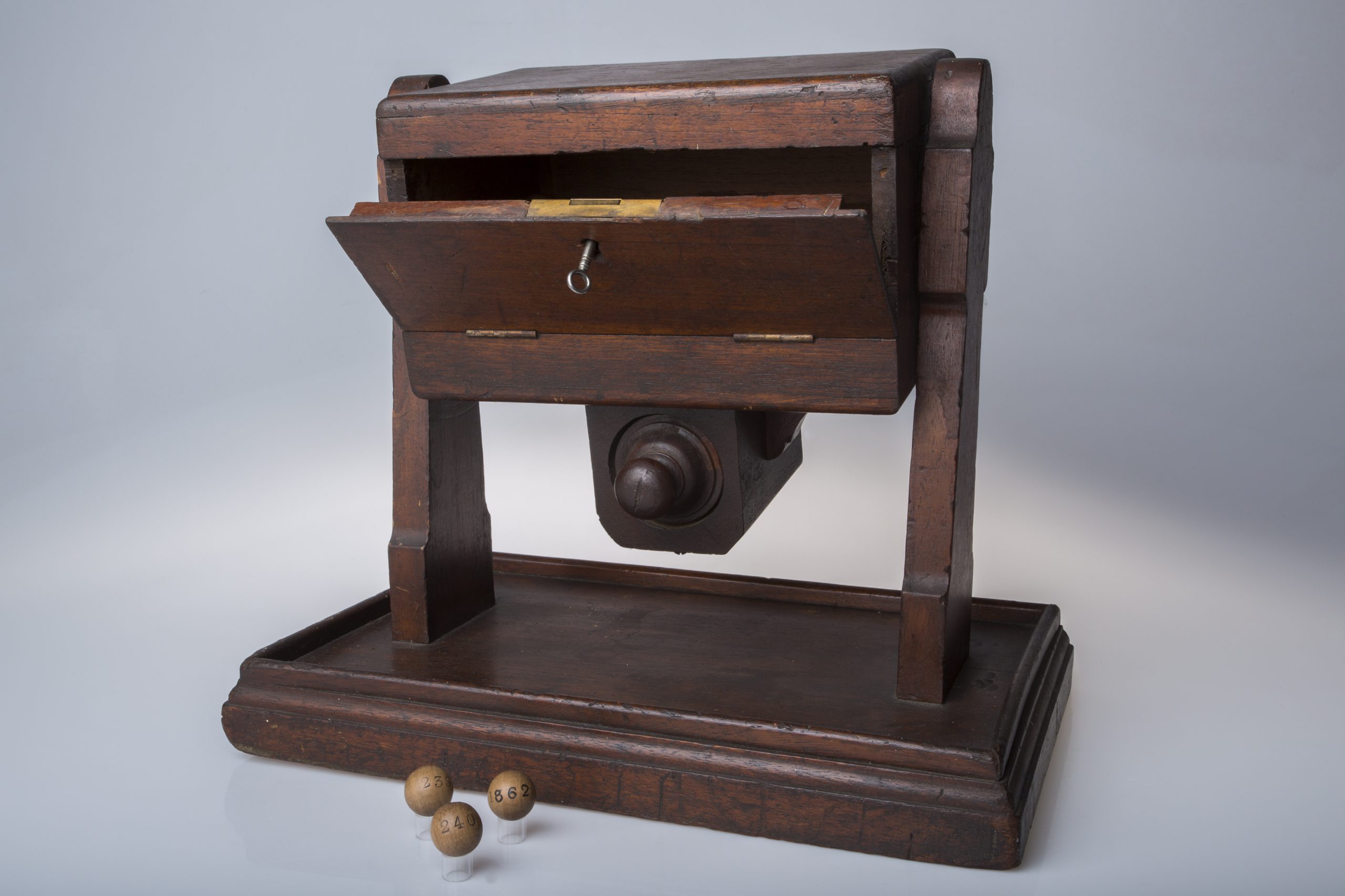 wooden ballot box with open drawer