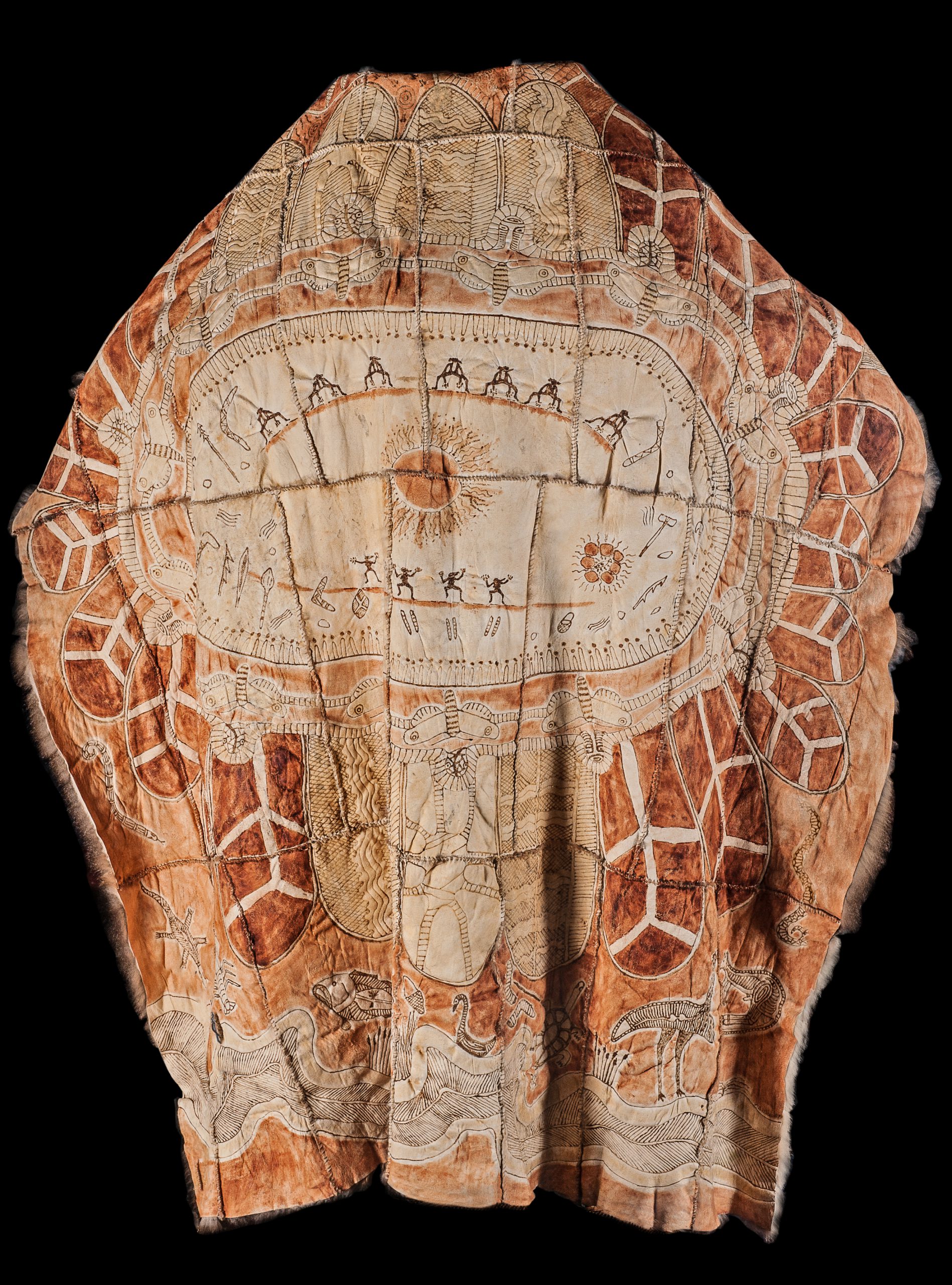 possum skin cloak covered in painted Aboriginal-style designs