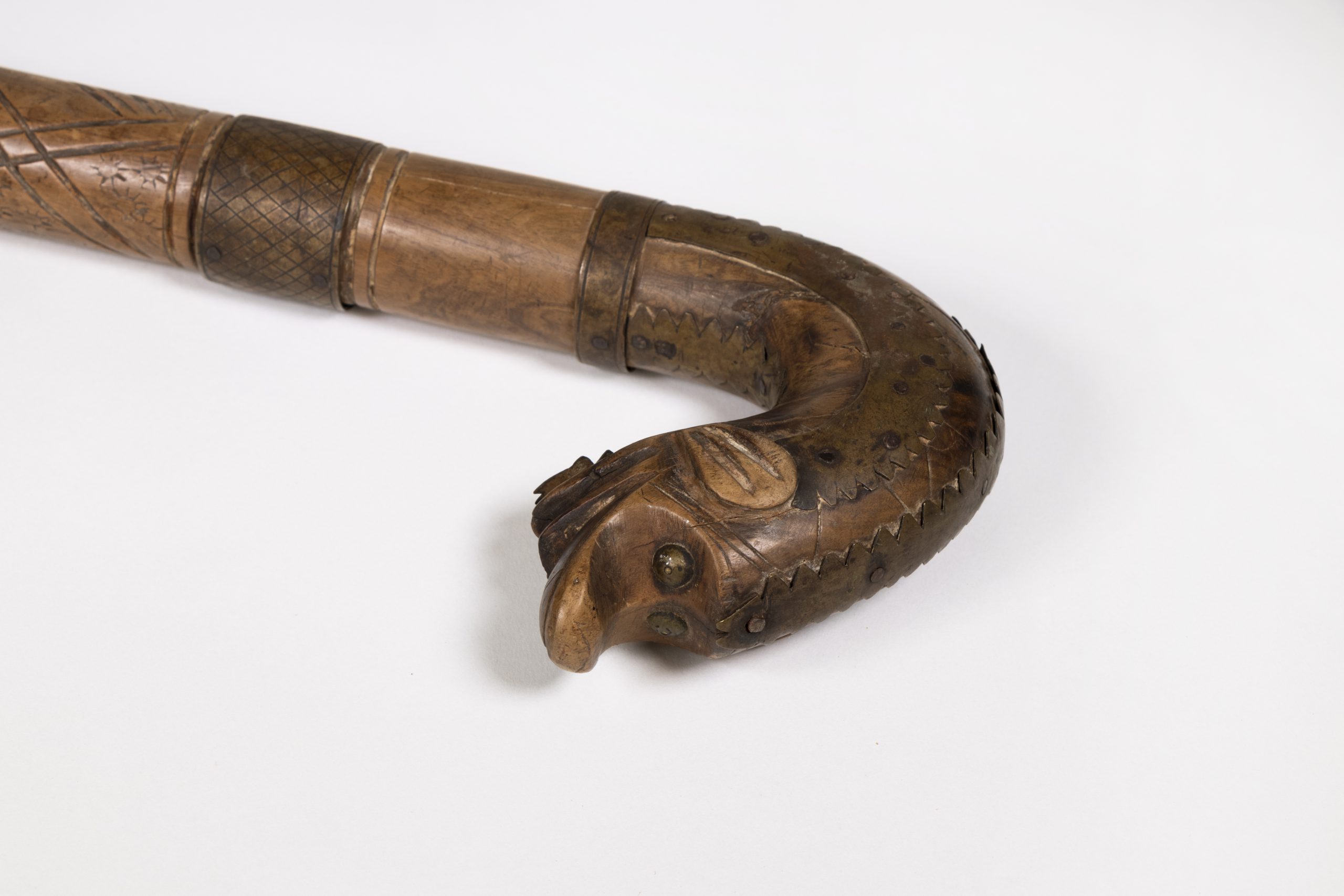 detailed, carved hook of a walking stick