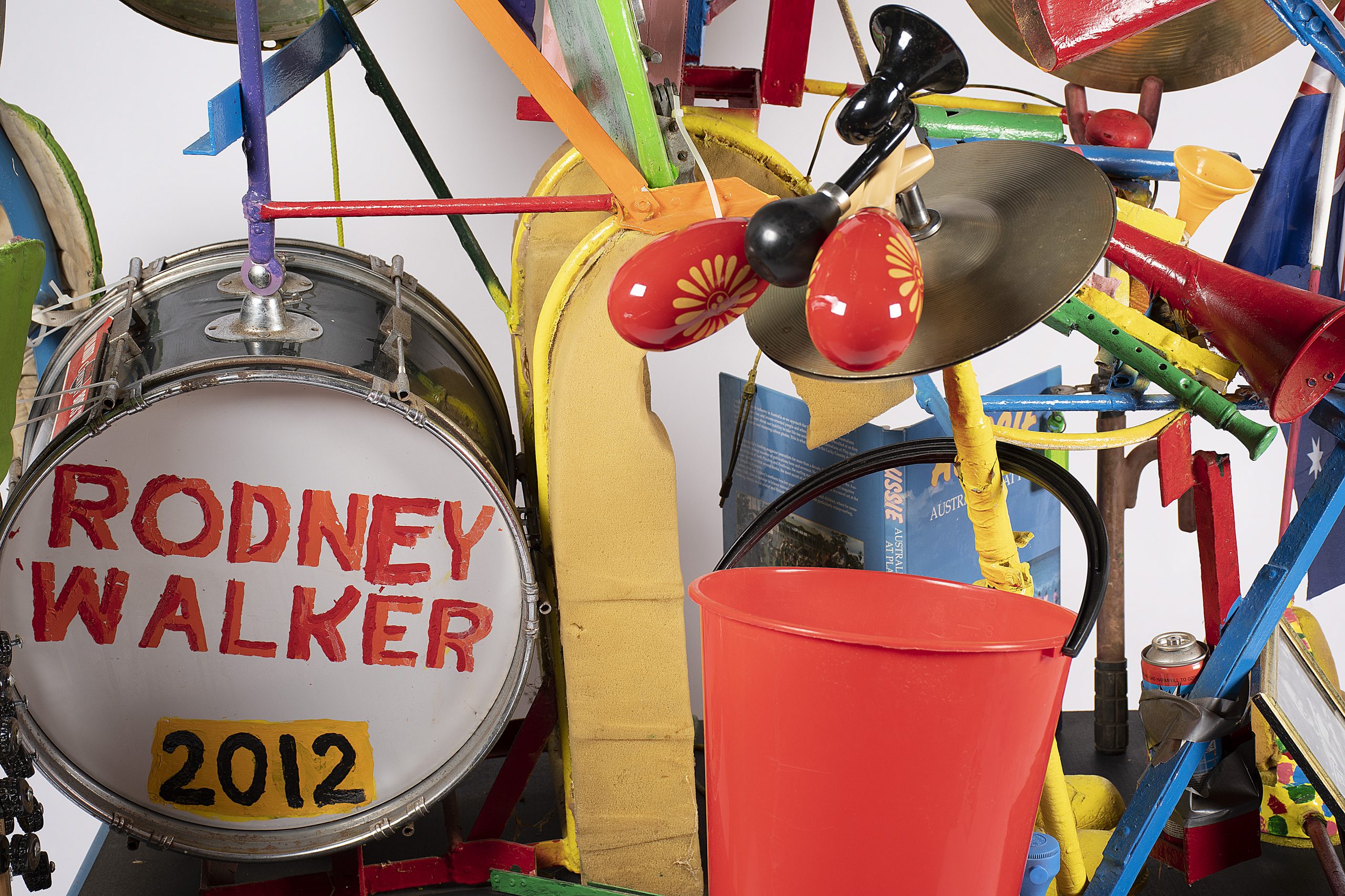 colourful assemblage of many instruments, the bass drum is labelled RODNEY WALKER 2012