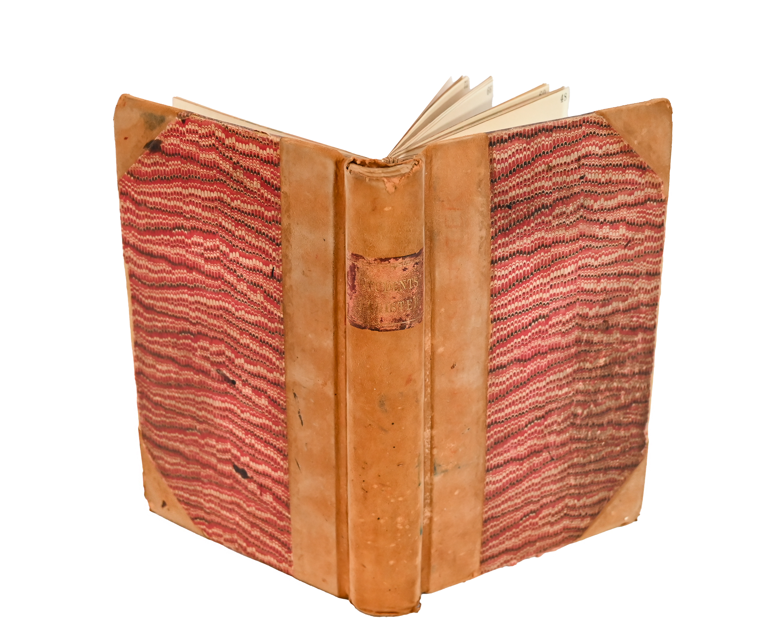 external hardcover of a student register, it has an oranges and speckled-red design